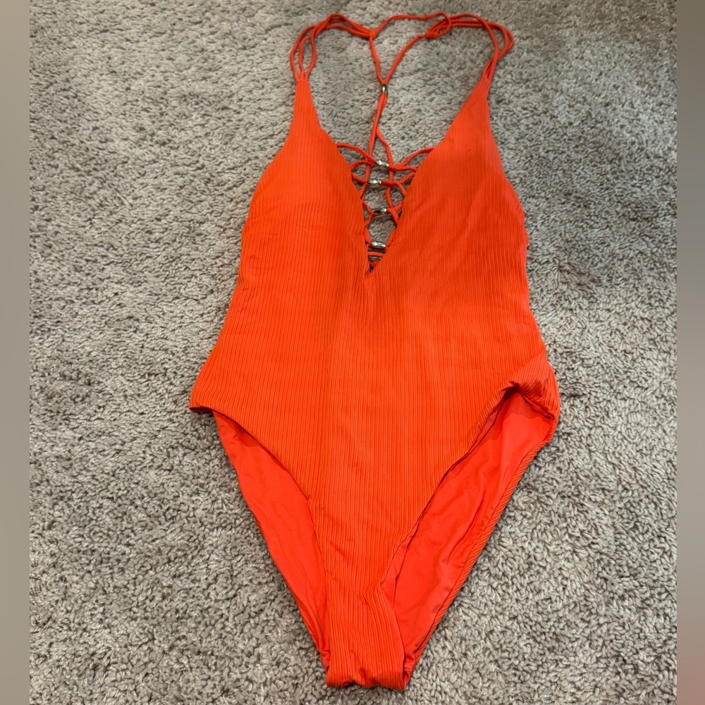 Bright Orange One-Piece Swimsuit with Lace-Up Front